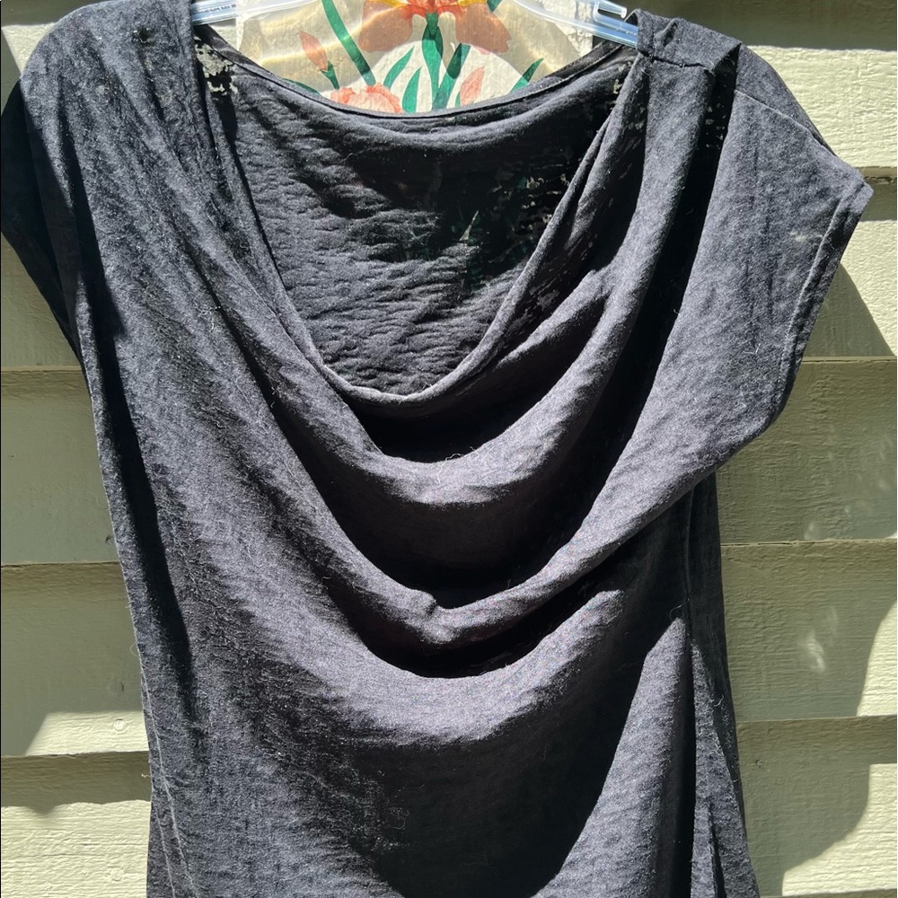 Sheer, black top with capped sleeves. Size M